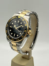Rolex GMT-Master II reference 116713LN with Rolex Warranty.