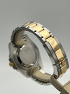Rolex GMT-Master II reference 116713LN with Rolex Warranty.